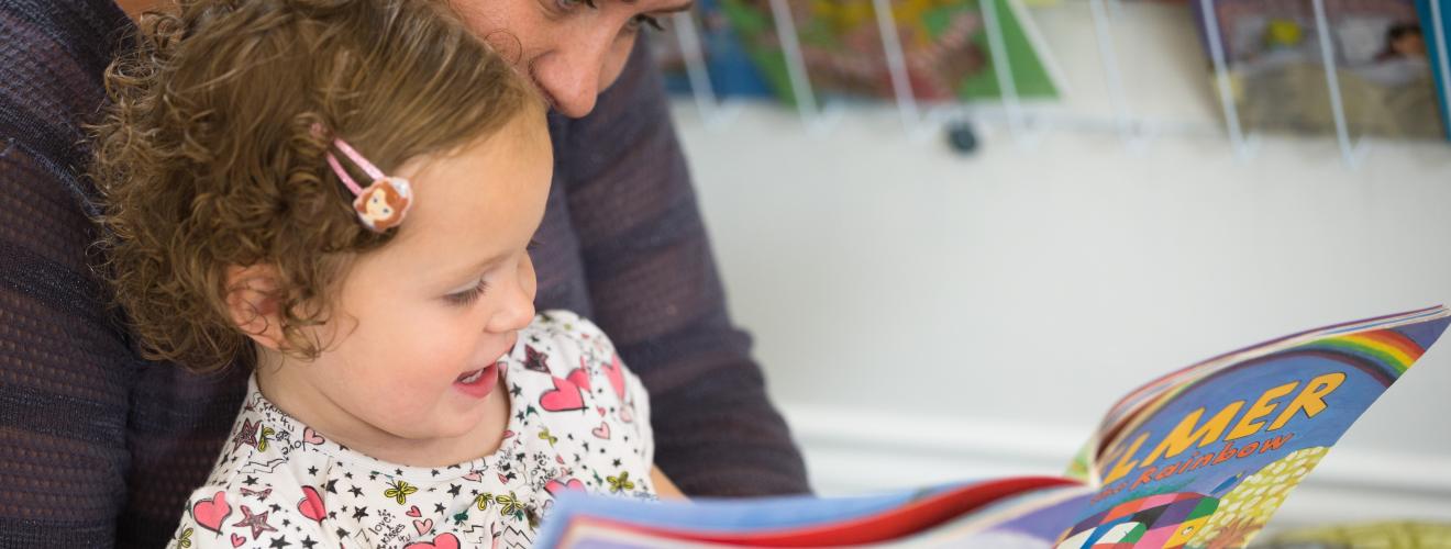 Mum and child reading