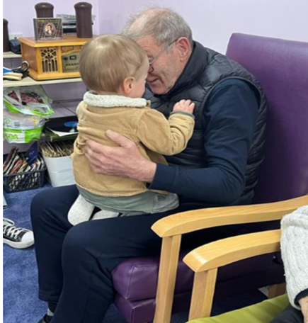 Intergenerational Peep - having a bosie Intergenerational Peep - having a bosie